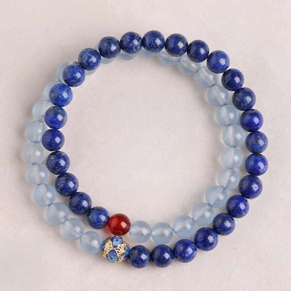 Flat lay view of the "Blue Wisdom" lapis lazuli and aquamarine bracelet, showing the full circular design