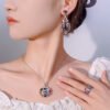 Female model wearing full seven chakra rainbow zircon jewelry set earrings necklace ring real wearing photo