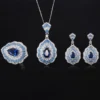 Whole collection baroque fan teardrop simulated sapphire 3 piece jewelry set earrings necklace ring flat lay black background