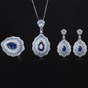 Whole collection baroque fan teardrop simulated sapphire 3 piece jewelry set earrings necklace ring flat lay black background