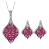 Whole two piece simulated ruby pave phoenix tail jewelry set earrings and necklace isolated white background