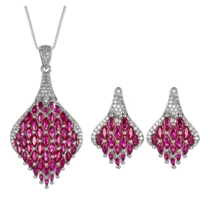 Whole two piece simulated ruby pave phoenix tail jewelry set earrings and necklace isolated white background