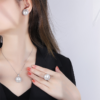 Female model wearing full double halo pearl 3 piece jewelry set earrings necklace ring real wearing lifestyle photo