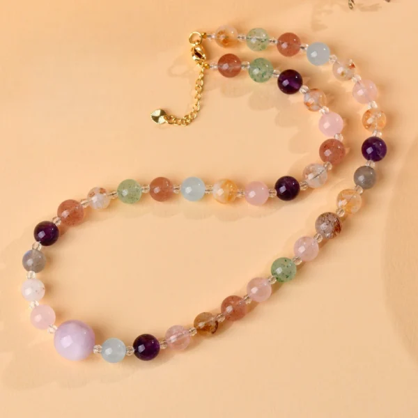 Top down overhead main product photo natural multi crystal adjustable rutilated quartz amethyst love attraction clavicle necklace