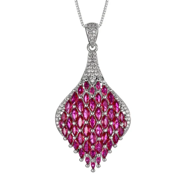 Single phoenix tail teardrop simulated ruby pave pendant necklace silver plated white background product shot