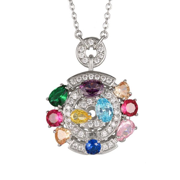 Seven chakra rainbow cubic zirconia concentric round compass pendant necklace white background product shot